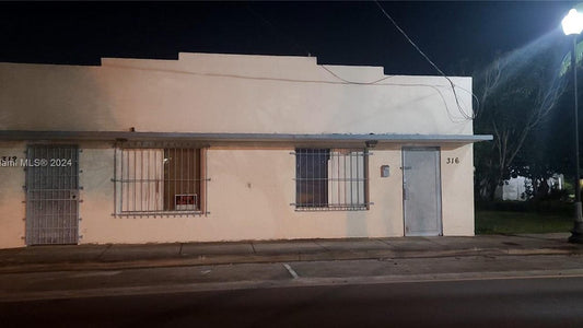 312 SW 4 ST